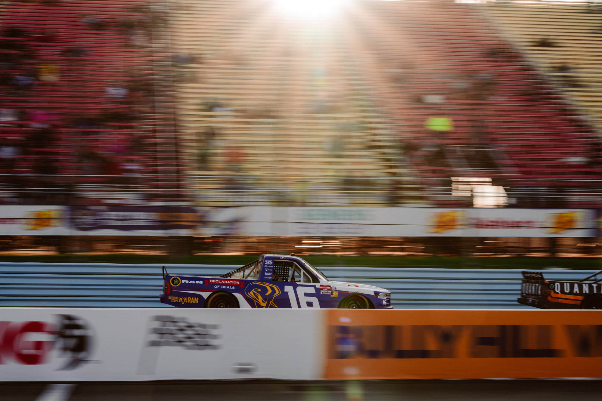 A truck races into the sunset at Watkins Glen International