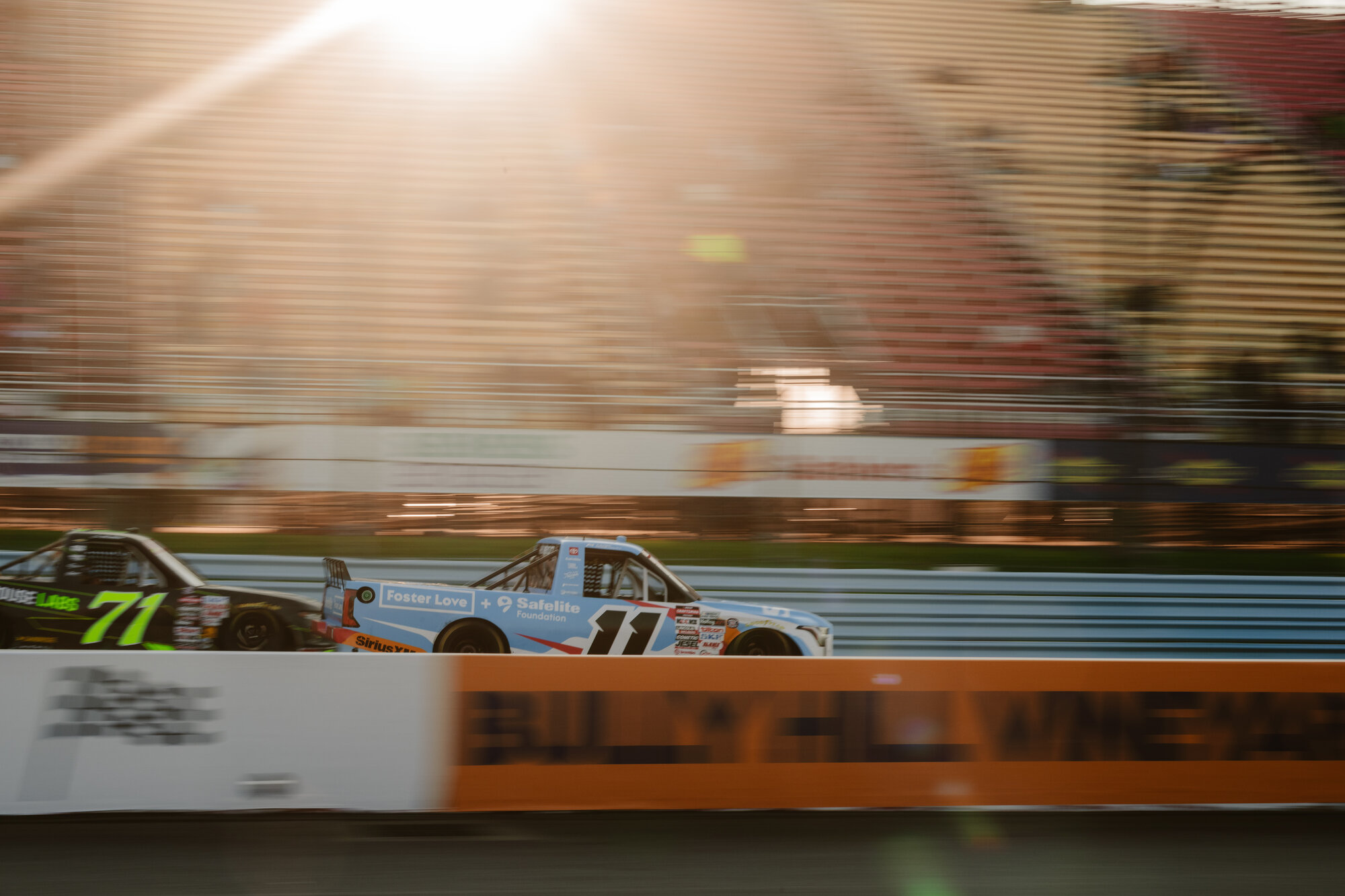 Trucks race through a turn at Watkins Glen International