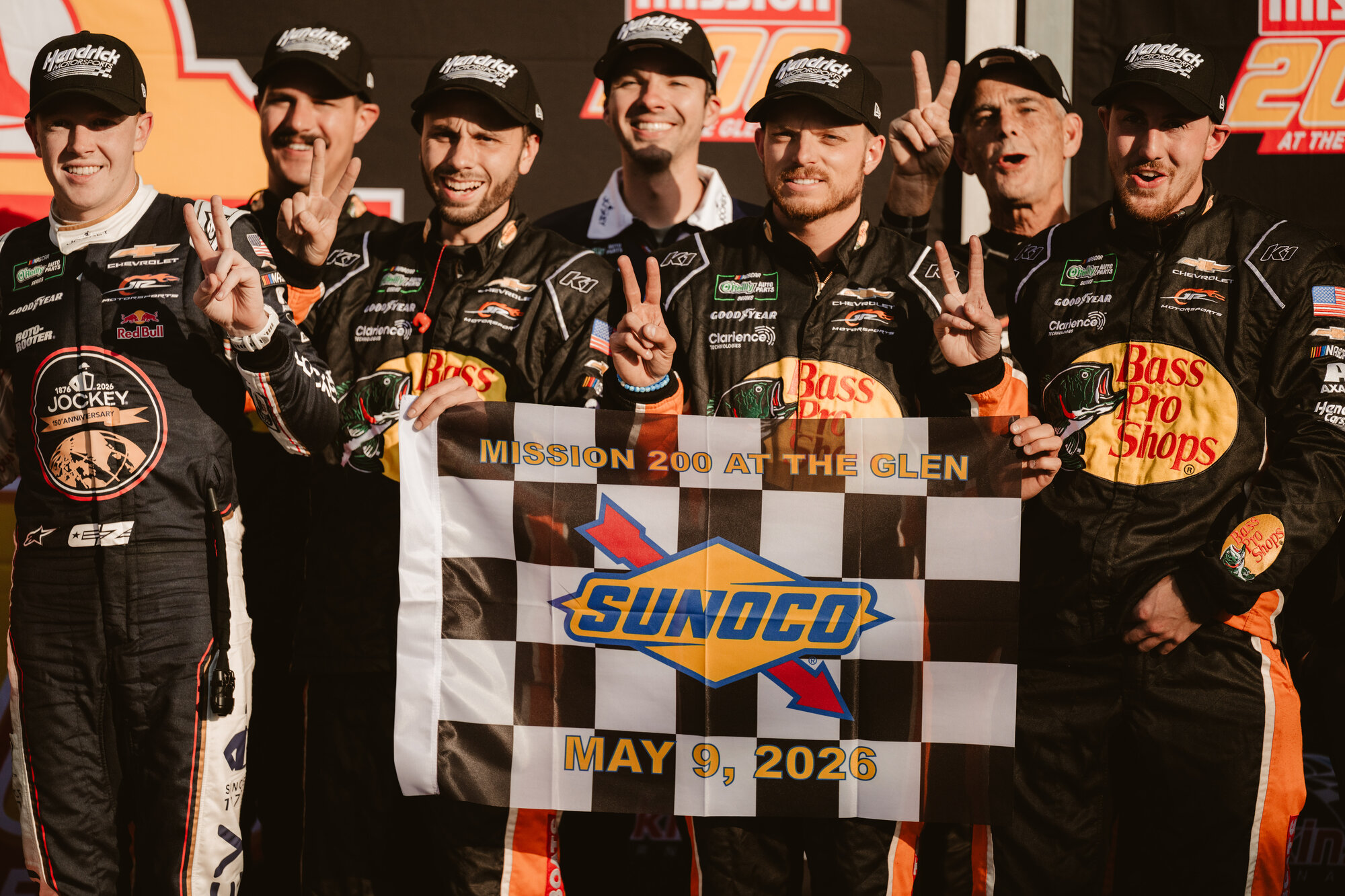 Connor Zilisch's crew celebrates after the Mission 200 at the Glen