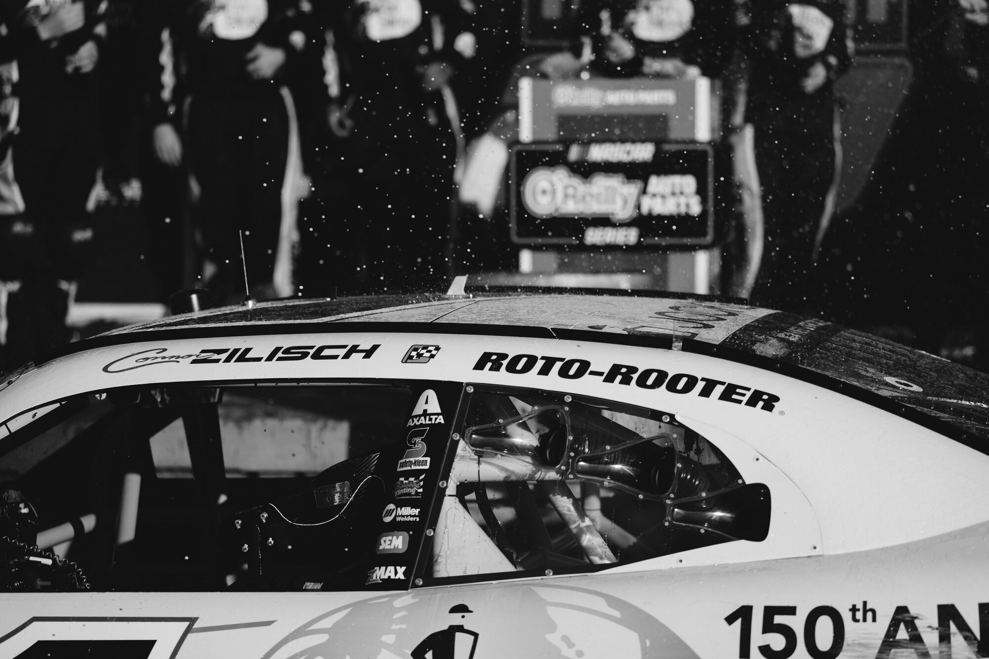 Connor Zilisch celebrates in victory lane after winning the Mission 200 at the Glen