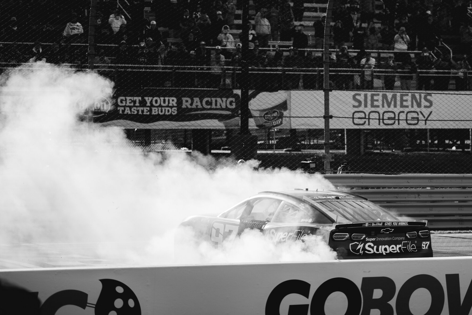 Shane van Gisbergen does a burnout in celebration at Watkins Glen International